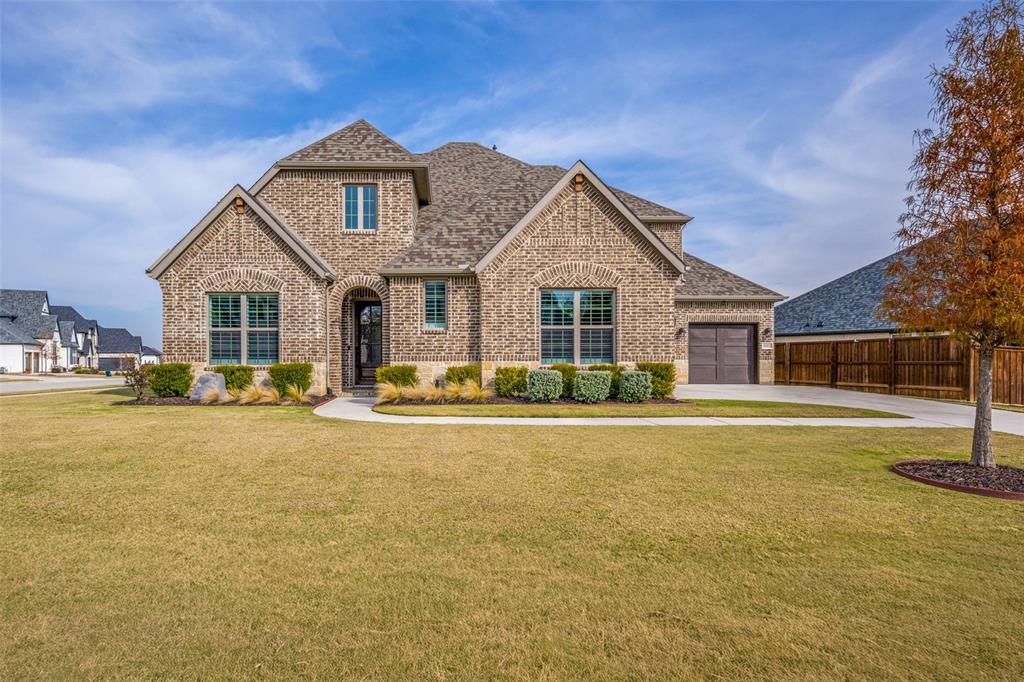 11112 Lacey Oak Ridge Flower Mound, TX 76226 - Photo 1 of 40 front view of a house with a yard