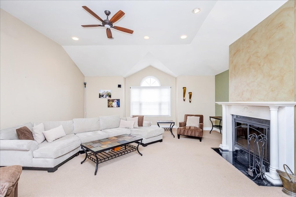 3 Danielle Drive Danvers, MA 01923 - Photo 11 of 41 a living room with furniture and a fireplace