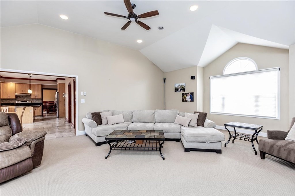 3 Danielle Drive Danvers, MA 01923 - Photo 12 of 41 a living room with furniture and a large window