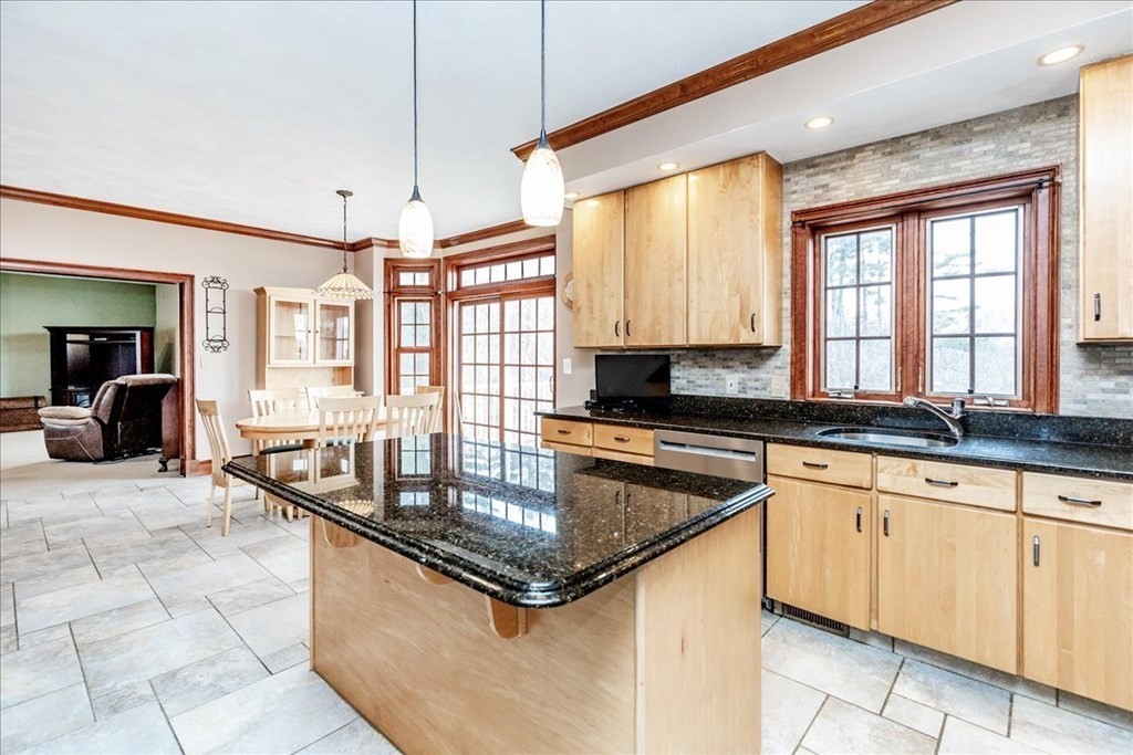 3 Danielle Drive Danvers, MA 01923 - Photo 16 of 41 a kitchen with granite countertop a sink a counter top space cabinets and stainless steel appliances