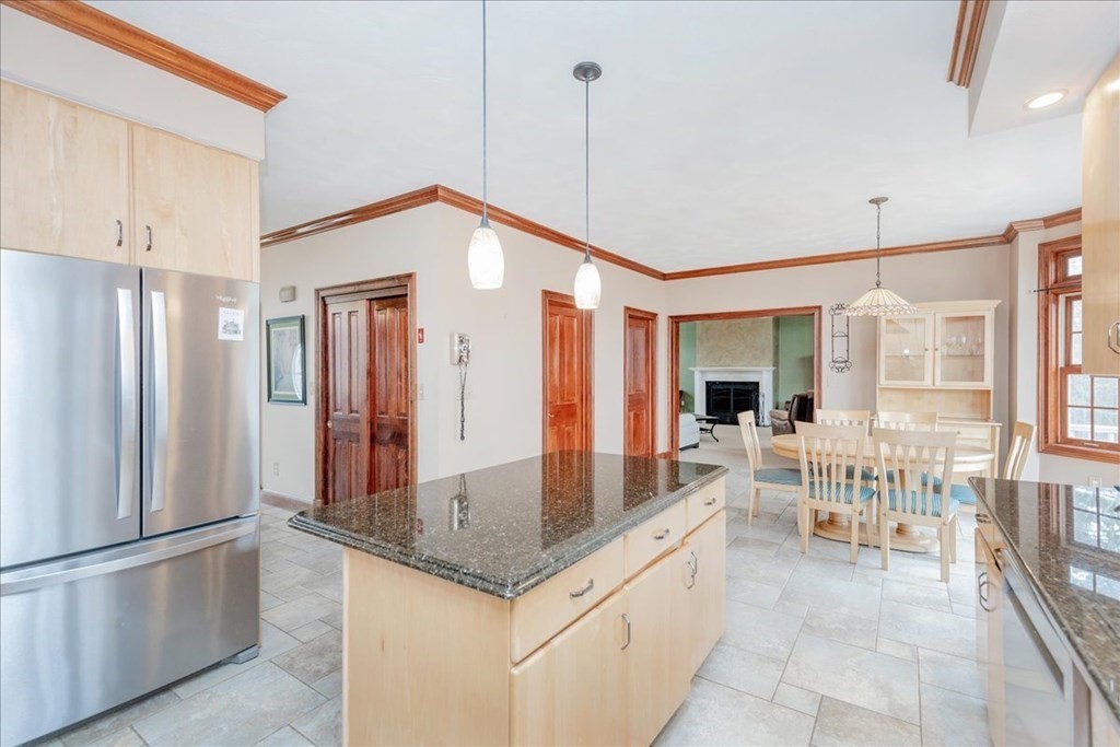 3 Danielle Drive Danvers, MA 01923 - Photo 18 of 41 a kitchen with stainless steel appliances granite countertop a refrigerator a oven and white cabinets