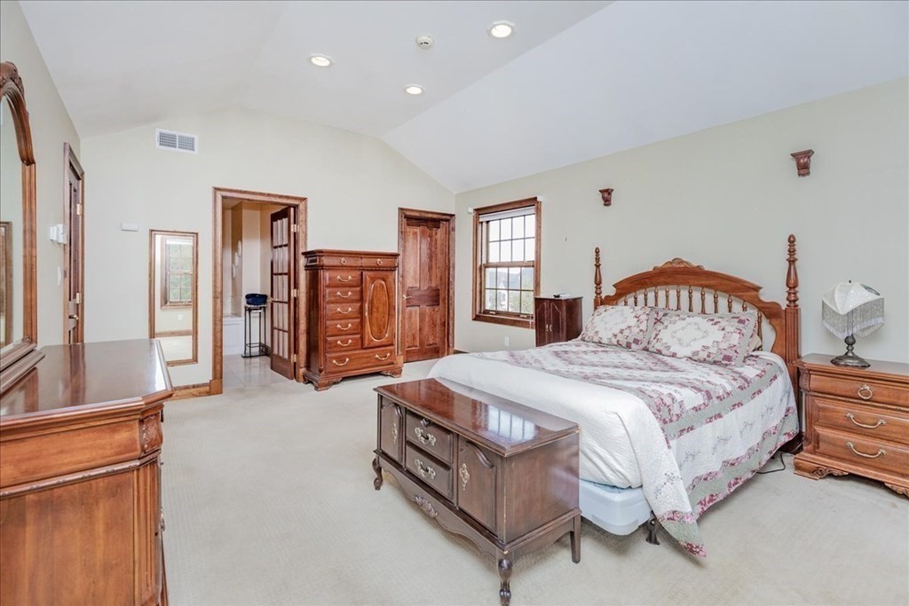 3 Danielle Drive Danvers, MA 01923 - Photo 34 of 41 a spacious bedroom with a bed and a dresser