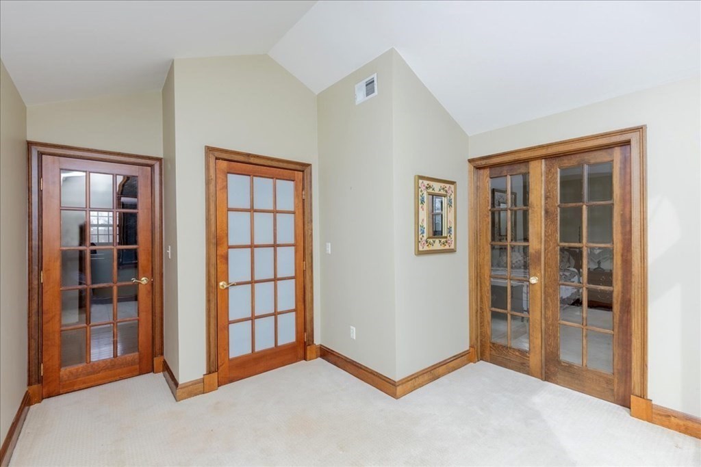 3 Danielle Drive Danvers, MA 01923 - Photo 36 of 41 a view of an empty room with window and stairs
