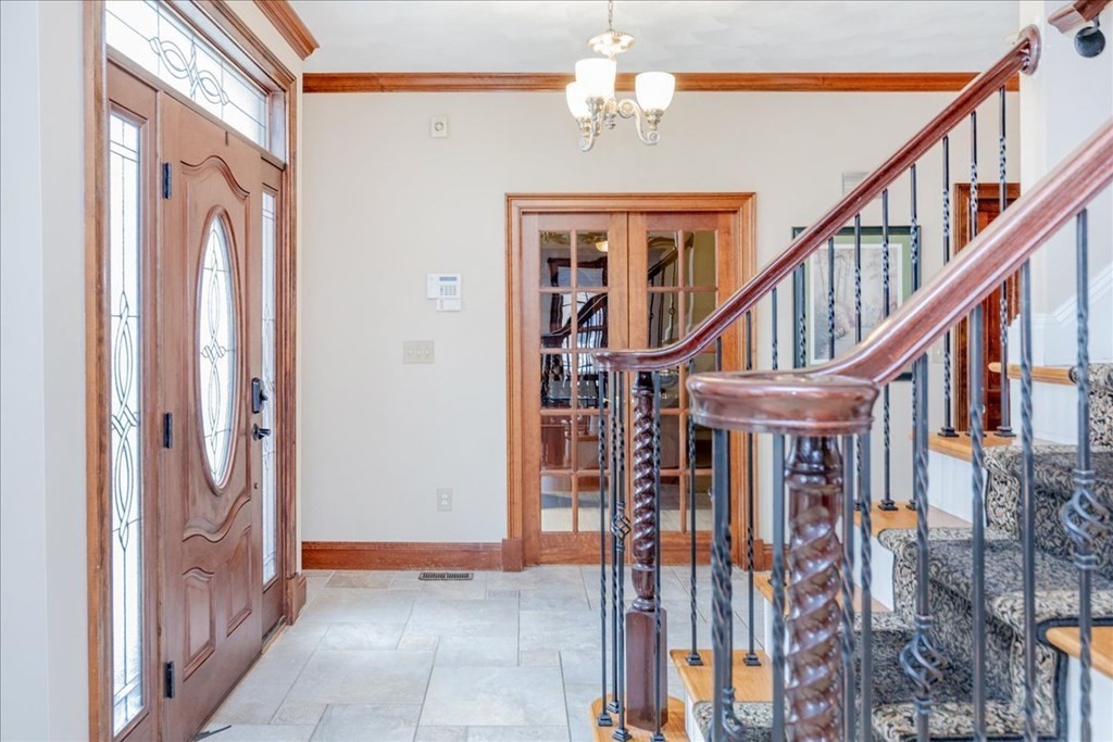 3 Danielle Drive Danvers, MA 01923 - Photo 6 of 41 a view of entryway and hall with a chandelier