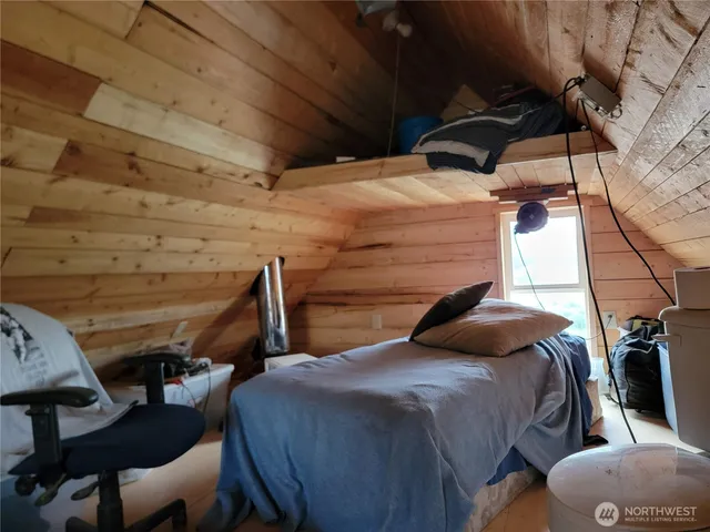 a bed and a table in a room