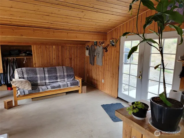 a bedroom with furniture and window