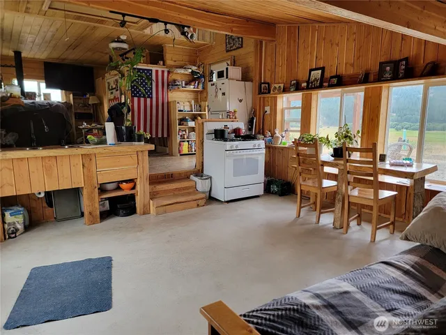 a white refrigerator freezer sitting in a kitchen