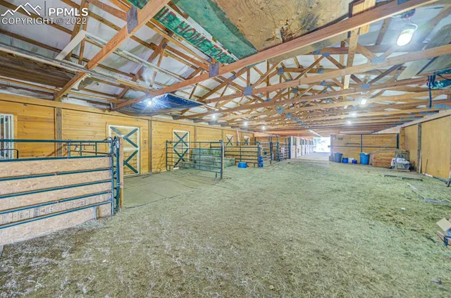 a view of a backyard with sitting area