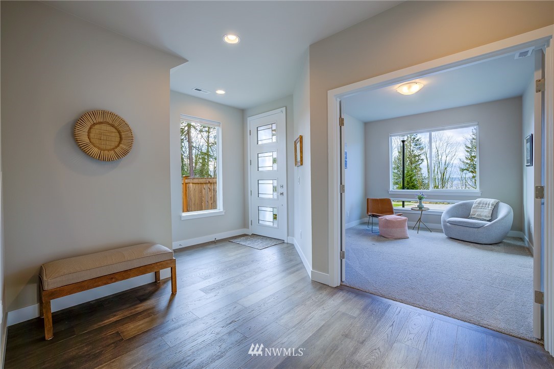 4792 Smithers Avenue South Renton, WA 98055 - Photo 16 of 37 a view of a livingroom with furniture and windows