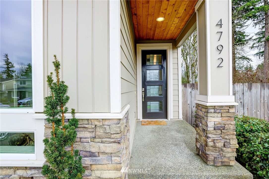 4792 Smithers Avenue South Renton, WA 98055 - Photo 2 of 37 a front view of a house with a yard