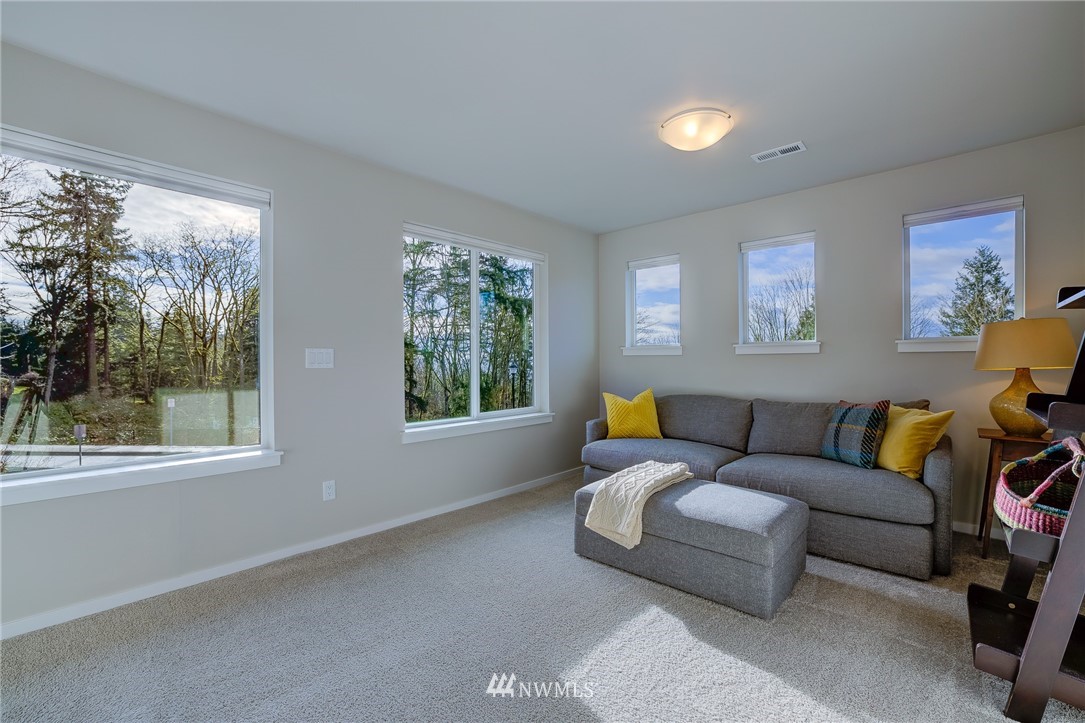 4792 Smithers Avenue South Renton, WA 98055 - Photo 21 of 37 a living room with furniture and a window