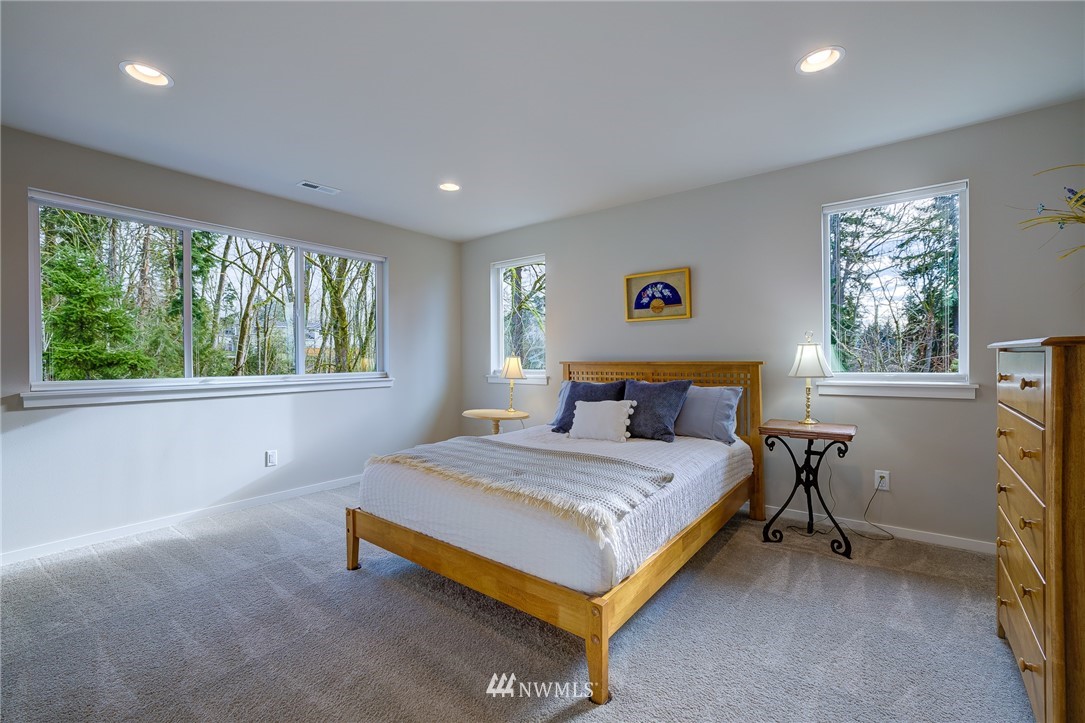 4792 Smithers Avenue South Renton, WA 98055 - Photo 22 of 37 a bedroom with a bed and a table