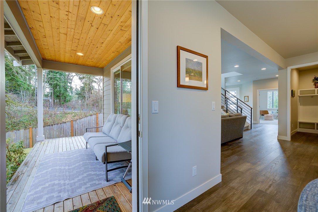 4792 Smithers Avenue South Renton, WA 98055 - Photo 33 of 37 a living room with furniture and a wooden floor