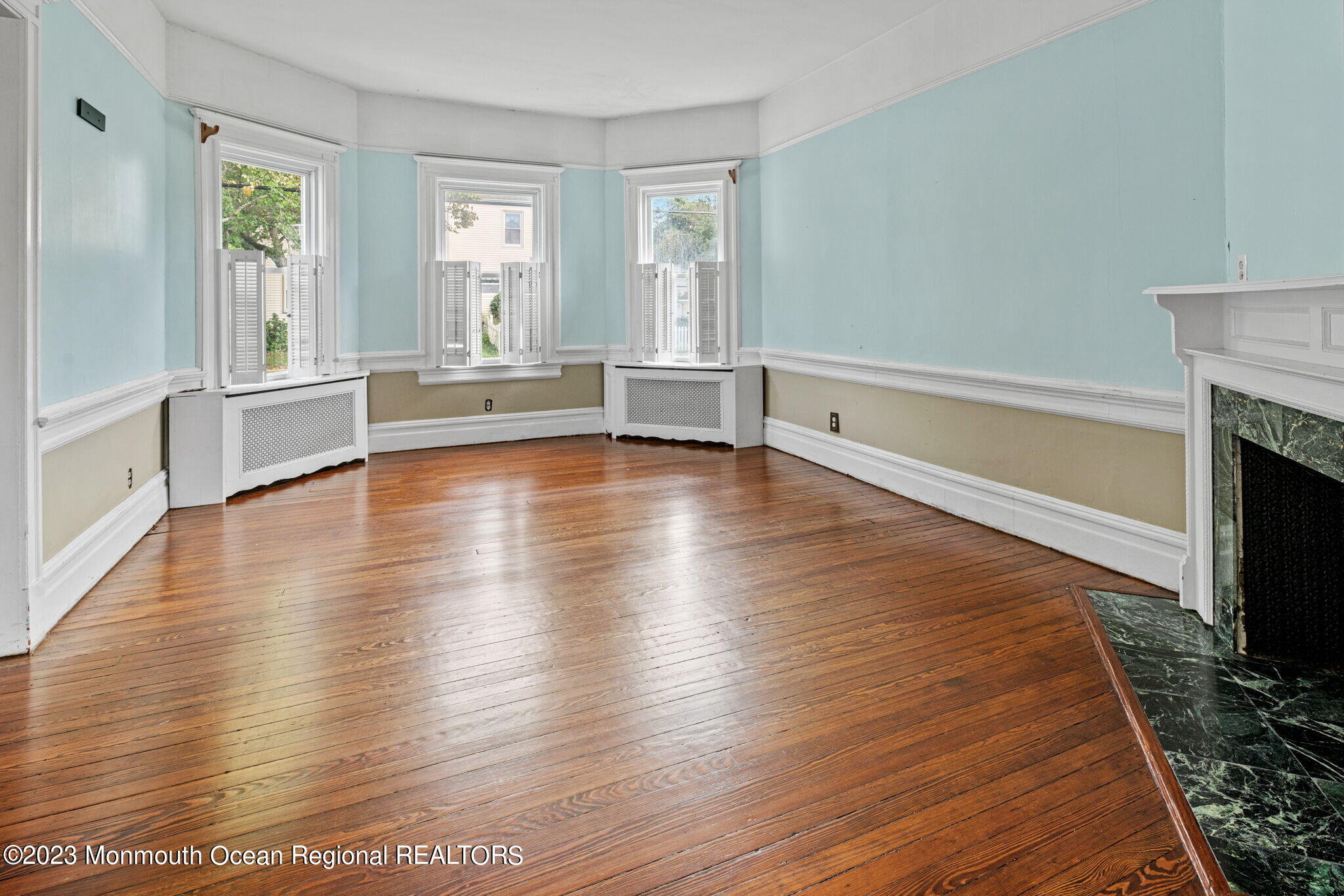420 River Road Fair Haven, NJ 07704 - Photo 12 of 34 a view of an empty room with a fireplace and a window