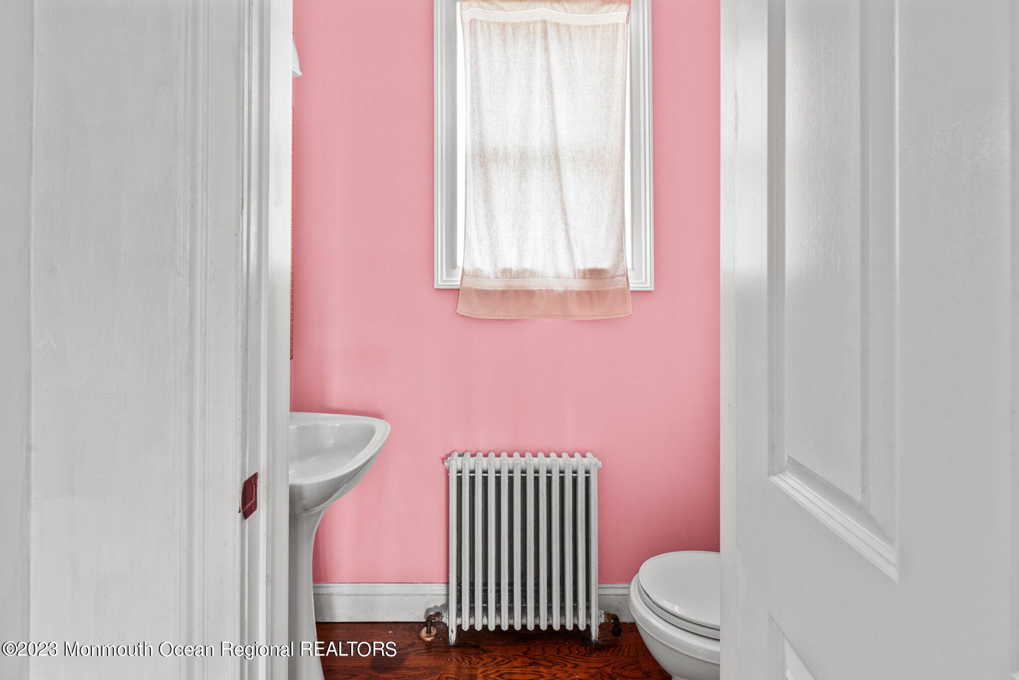 420 River Road Fair Haven, NJ 07704 - Photo 19 of 34 a bathroom with a sink toilet and mirror