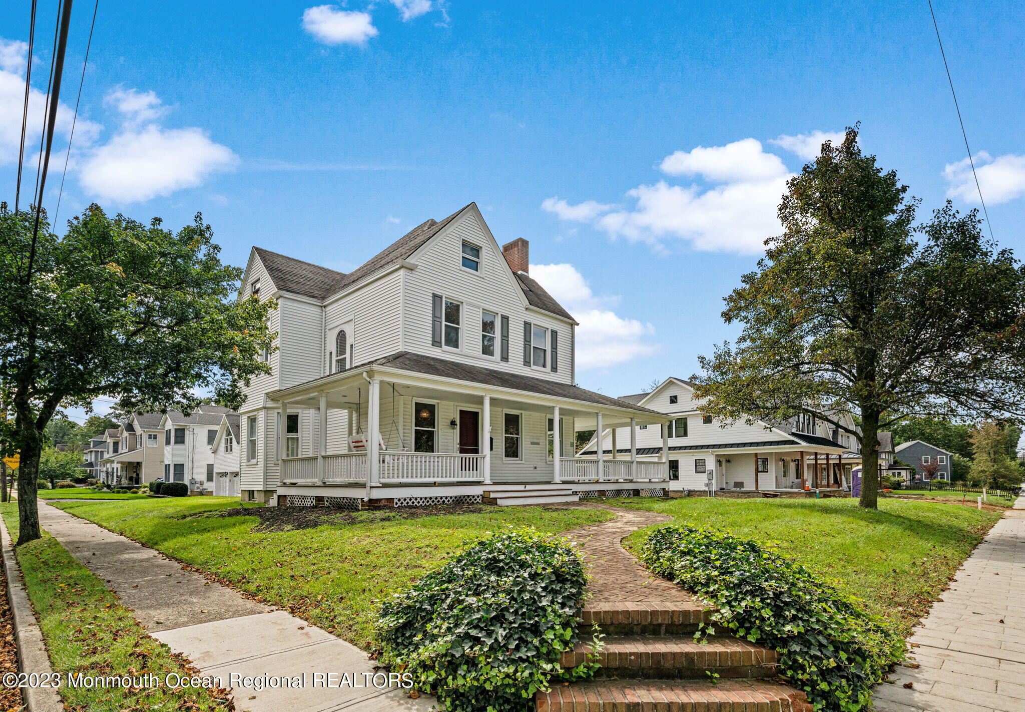 420 River Road Fair Haven, NJ 07704 - Photo 2 of 34 a front view of a house with a yard