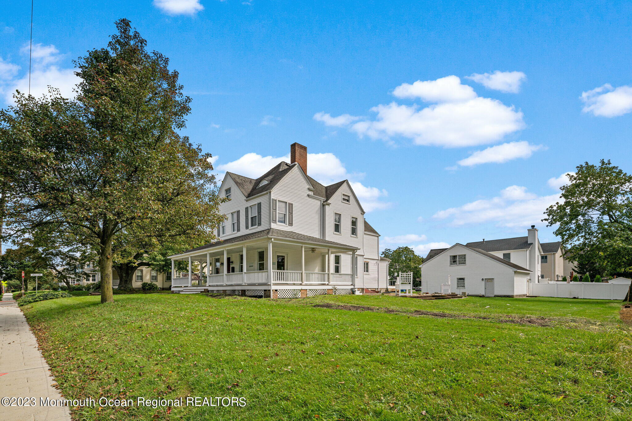 420 River Road Fair Haven, NJ 07704 - Photo 3 of 34 a front view of house with yard and trees