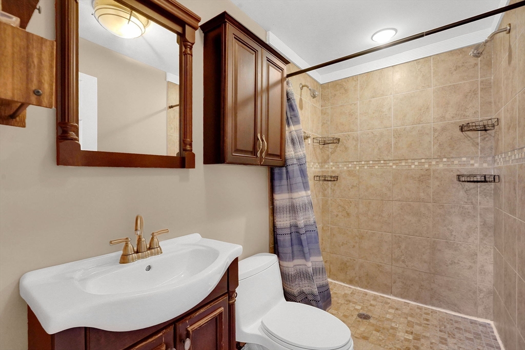 20 Old Orchard Road Wilbraham, MA 01095 - Photo 15 of 40 a bathroom with a sink toilet and shower