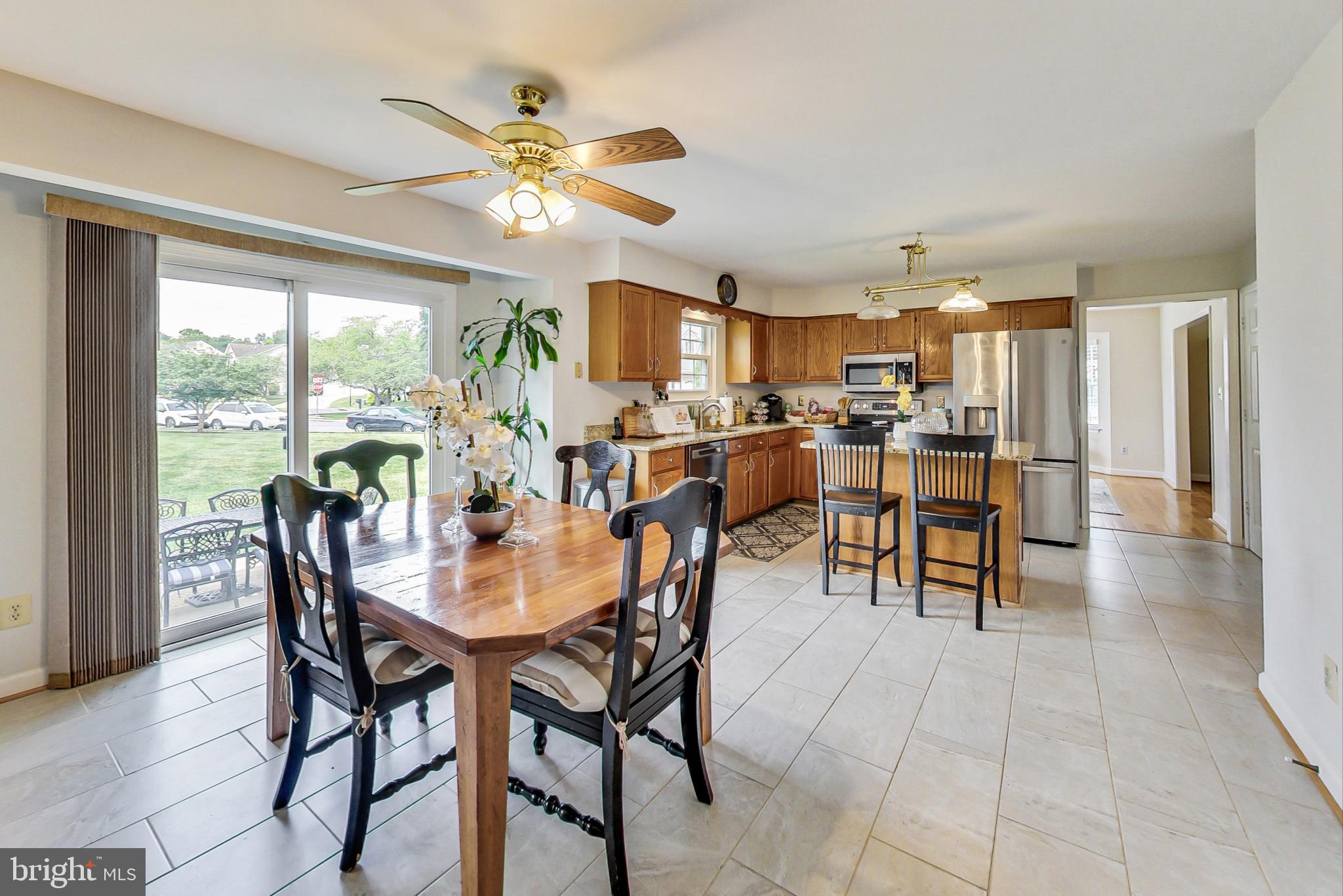 5312 Hever Way Frederick, MD 21703 - Photo 33 of 36 a view of a dining room with furniture window and wooden floor