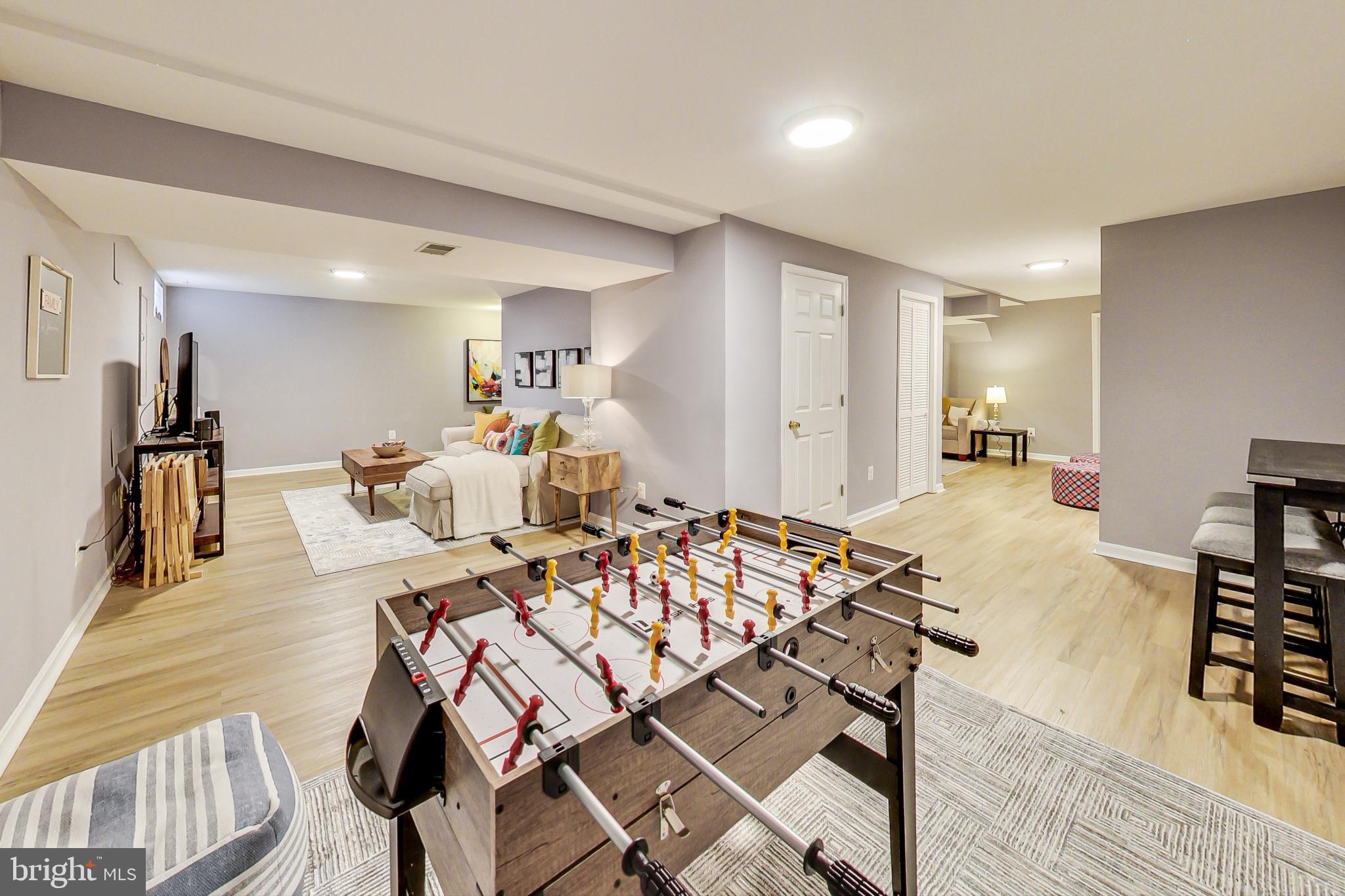 5312 Hever Way Frederick, MD 21703 - Photo 12 of 36 a living room with furniture and a table