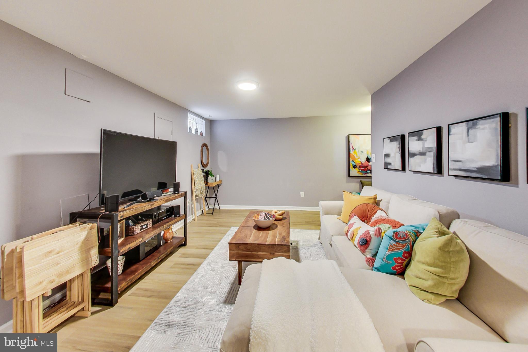 5312 Hever Way Frederick, MD 21703 - Photo 13 of 36 a bedroom with furniture and a flat screen tv