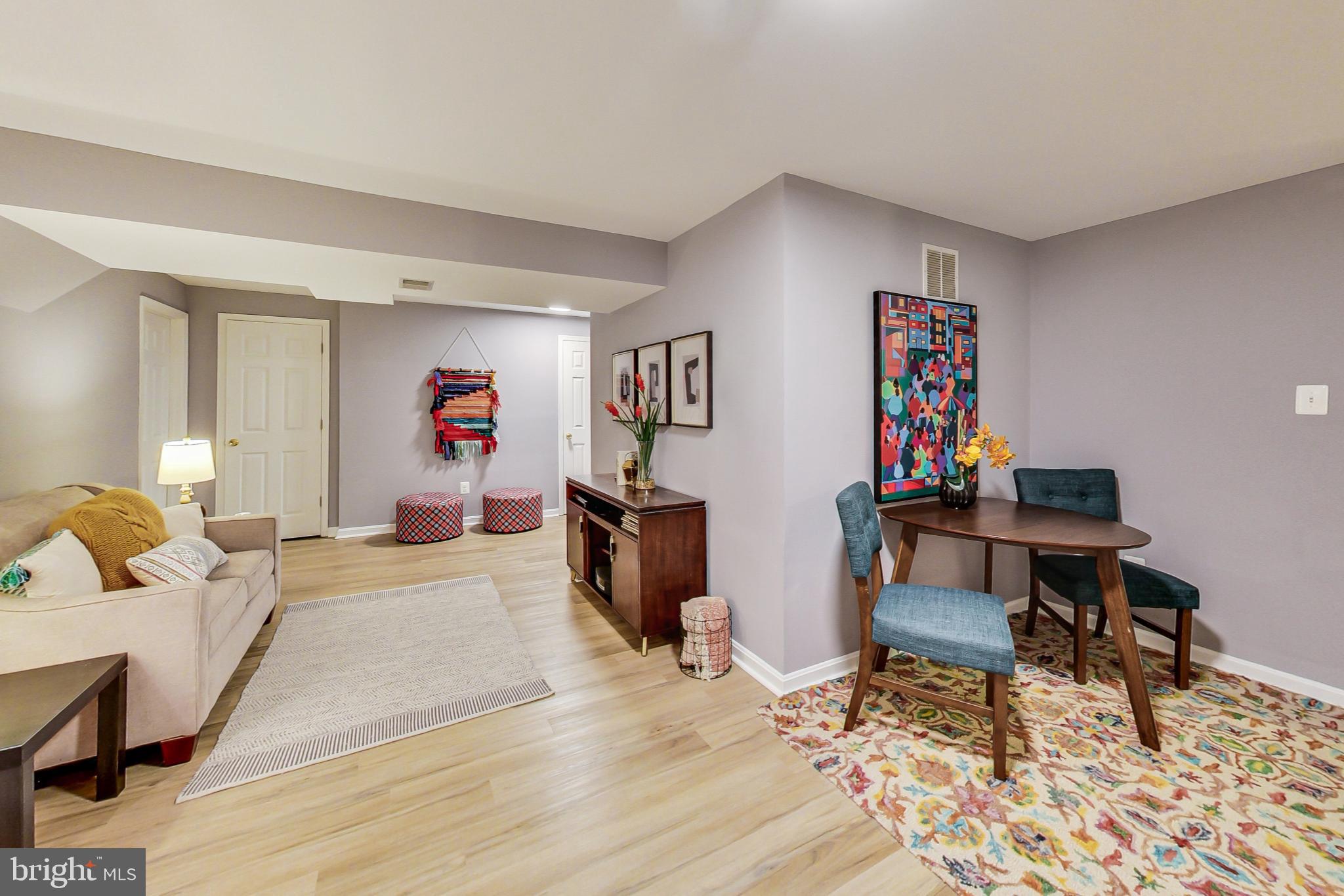 5312 Hever Way Frederick, MD 21703 - Photo 15 of 36 a living room with furniture and a wooden floor