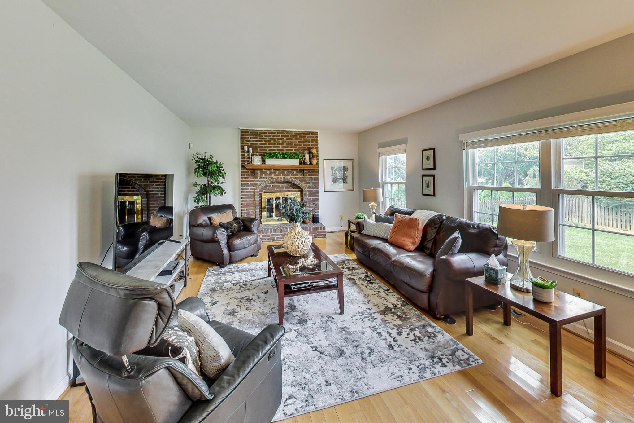 5312 Hever Way Frederick, MD 21703 - Photo 2 of 36 a living room with furniture wooden floor and a large window