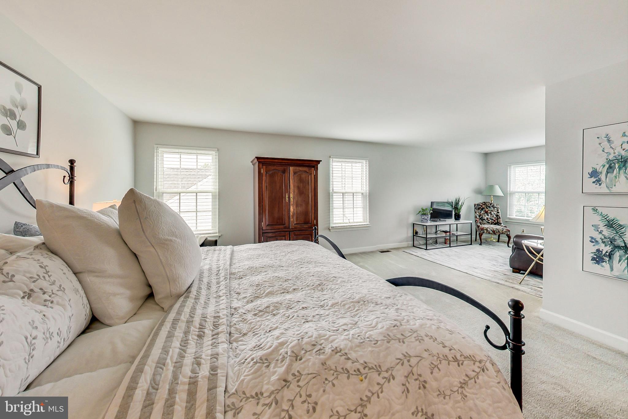 5312 Hever Way Frederick, MD 21703 - Photo 8 of 36 a large bedroom with a bed and window