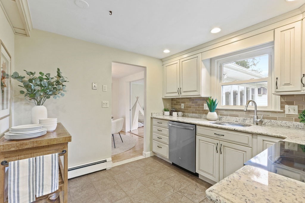 13 Wentworth Road Natick, MA 01760 - Photo 11 of 33 a kitchen with a sink and cabinets