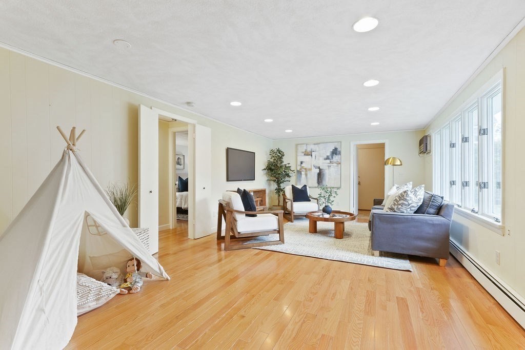 13 Wentworth Road Natick, MA 01760 - Photo 14 of 33 a living room with furniture and a wooden floor