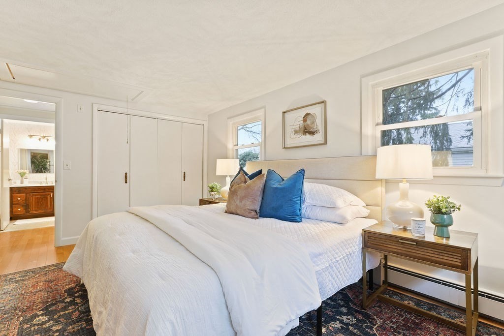 13 Wentworth Road Natick, MA 01760 - Photo 18 of 33 a bed room with a bed and a night stand