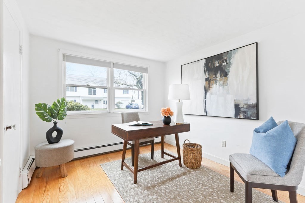 13 Wentworth Road Natick, MA 01760 - Photo 23 of 33 a workspace with furniture and a potted plant