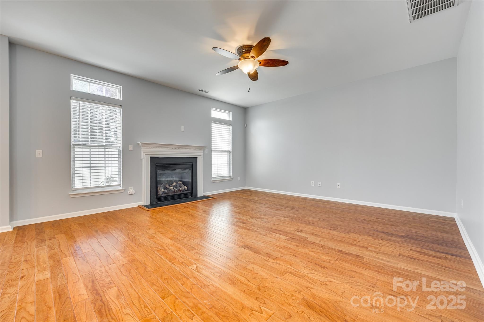 618 Bayou Circle Clover, SC 29710 - Photo 12 of 29 a view of an empty room with a fireplace and a window
