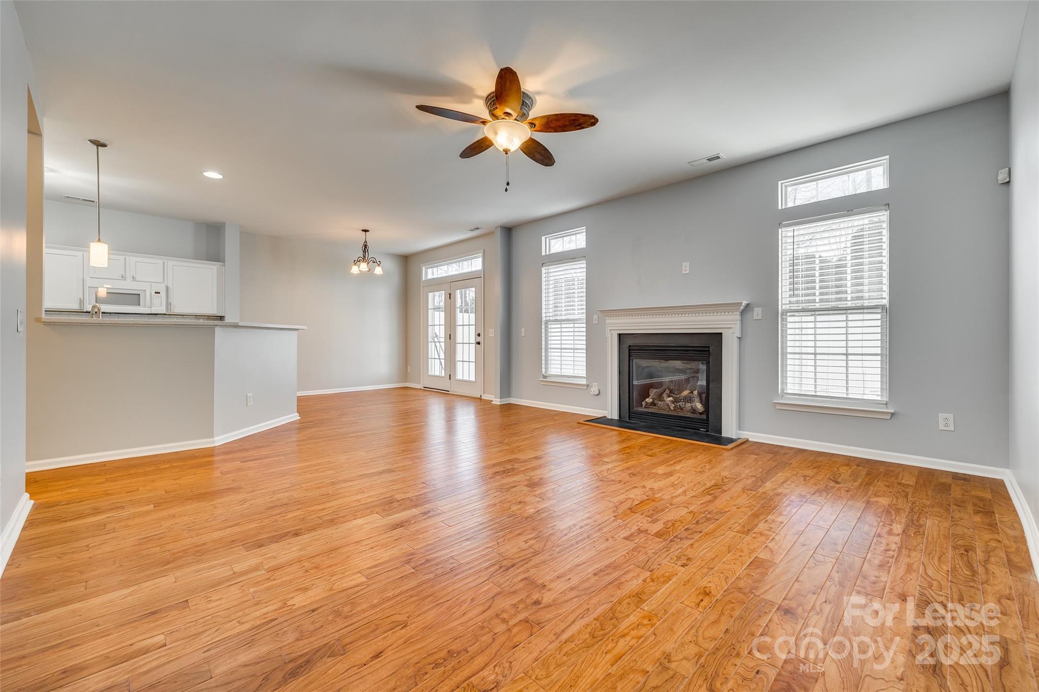 618 Bayou Circle Clover, SC 29710 - Photo 13 of 29 a view of an empty room with a kitchen and a window