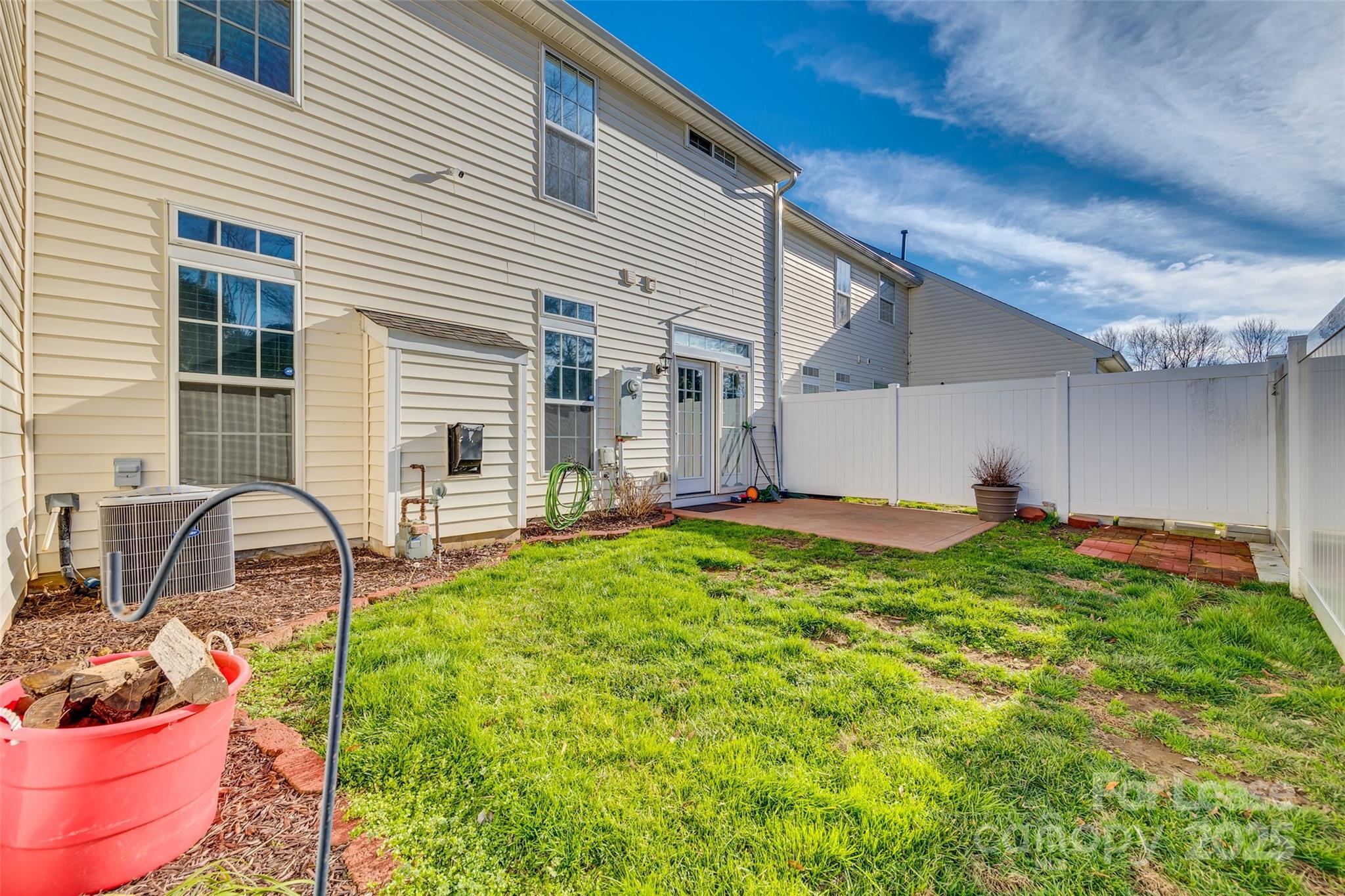 618 Bayou Circle Clover, SC 29710 - Photo 28 of 29 a view of a backyard with table and chairs and potted plants