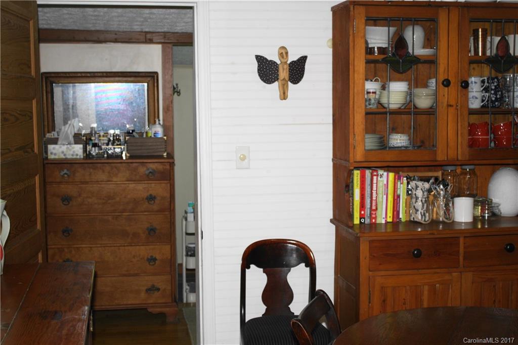 1335 White Oak Road Marshall, NC 28753 - Photo 11 of 24 a bathroom with a glass door shower and a sink