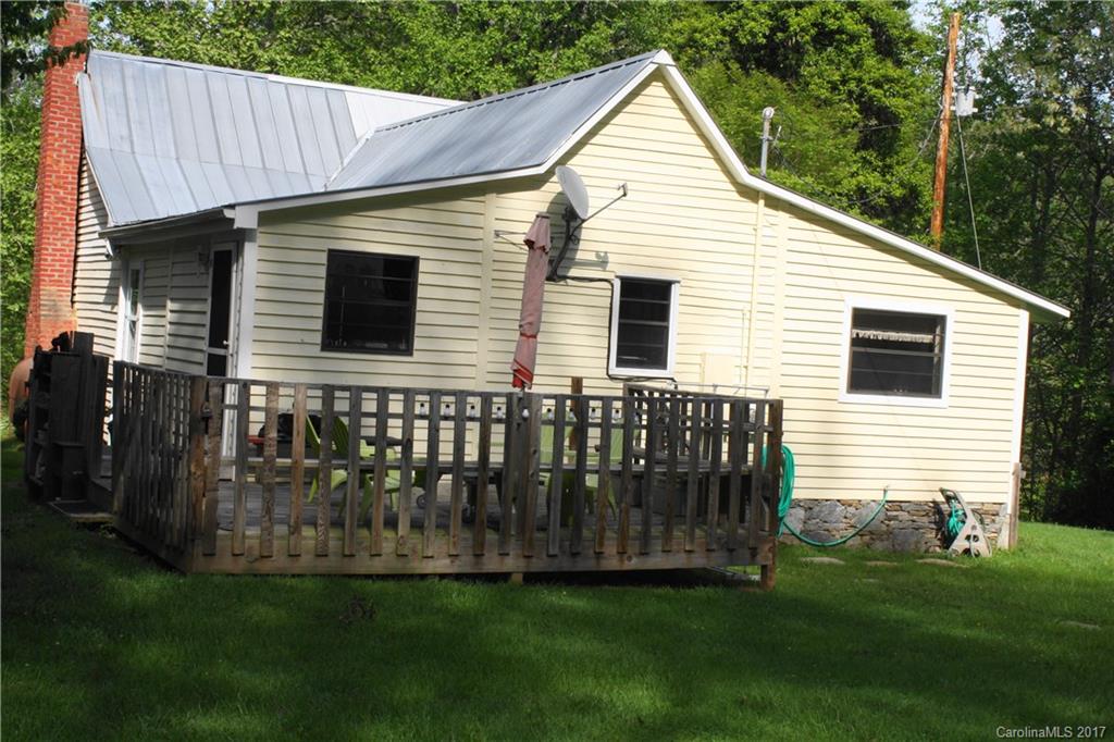 1335 White Oak Road Marshall, NC 28753 - Photo 18 of 24 a view of a house with a yard