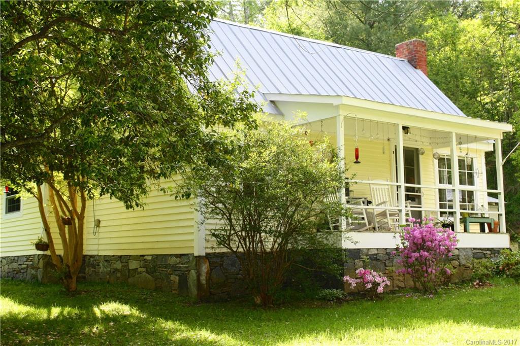 1335 White Oak Road Marshall, NC 28753 - Photo 23 of 24 a view of a house with a garden