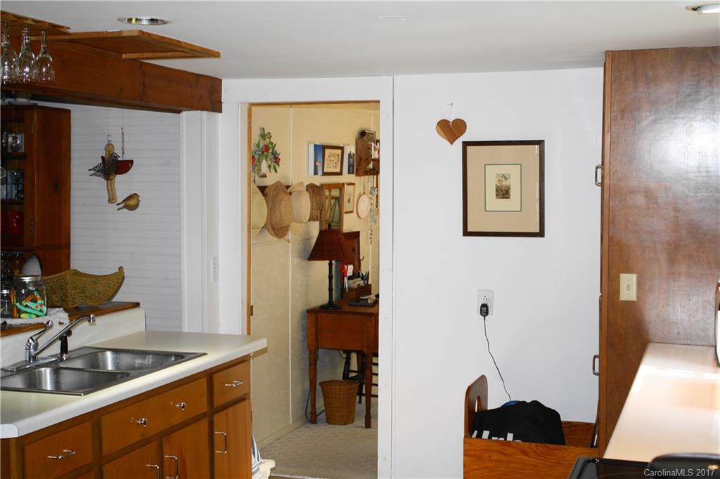 1335 White Oak Road Marshall, NC 28753 - Photo 5 of 24 a bathroom with a sink and a mirror