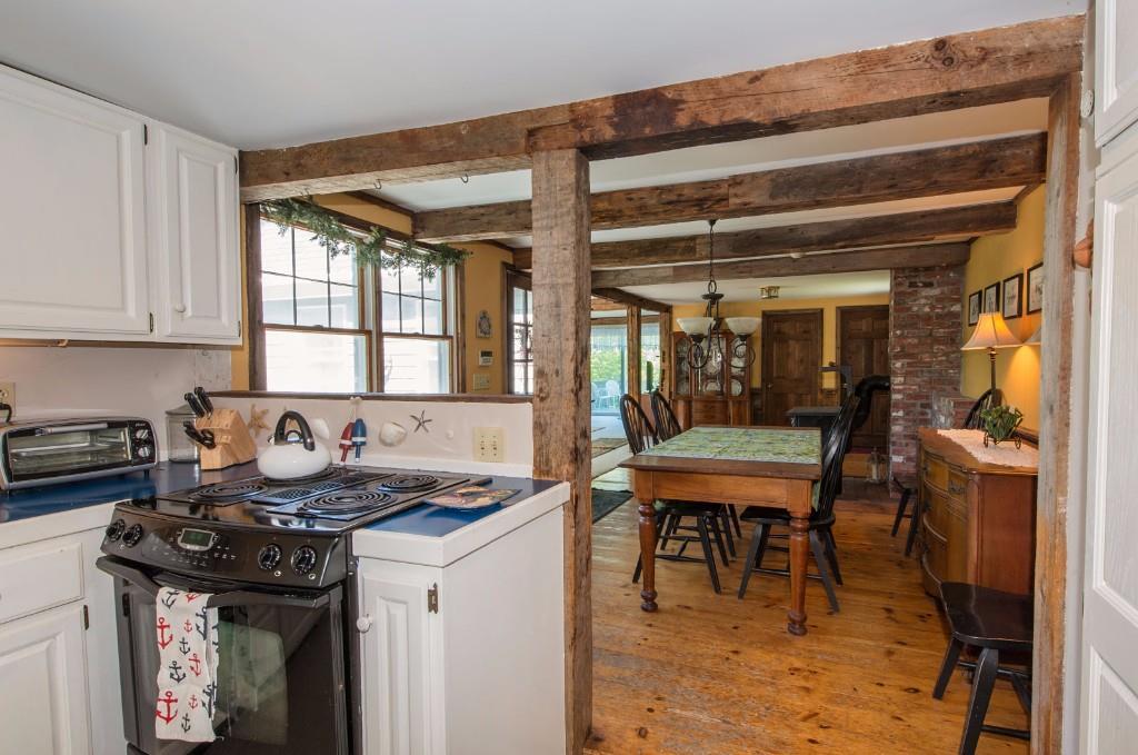 581 Ocean Point Road Boothbay, ME 04544 - Photo 9 of 25 A view into formal dining room and...
