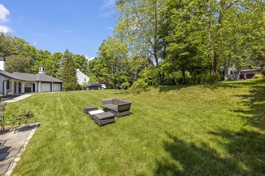 25 Somerset Road, Unit 2 Lexington, MA 02420 - Photo 16 of 17 a view of a house with pool and a yard