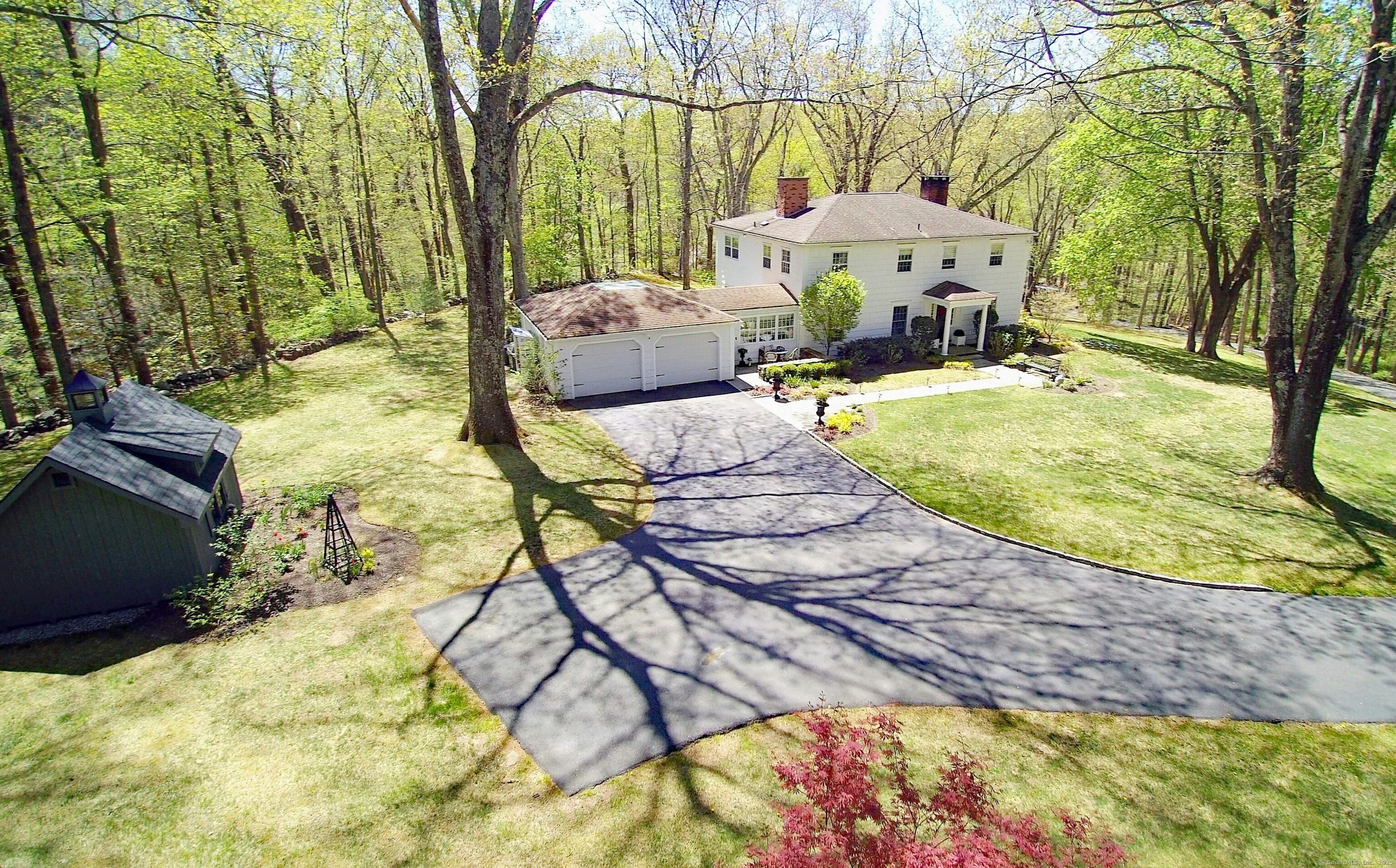 a view of swimming pool with a patio