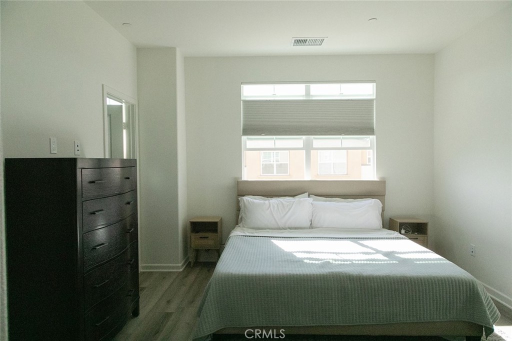 1976 Orchard Drive Placentia, CA 92870 - Photo 10 of 26 a bedroom with a bed and window