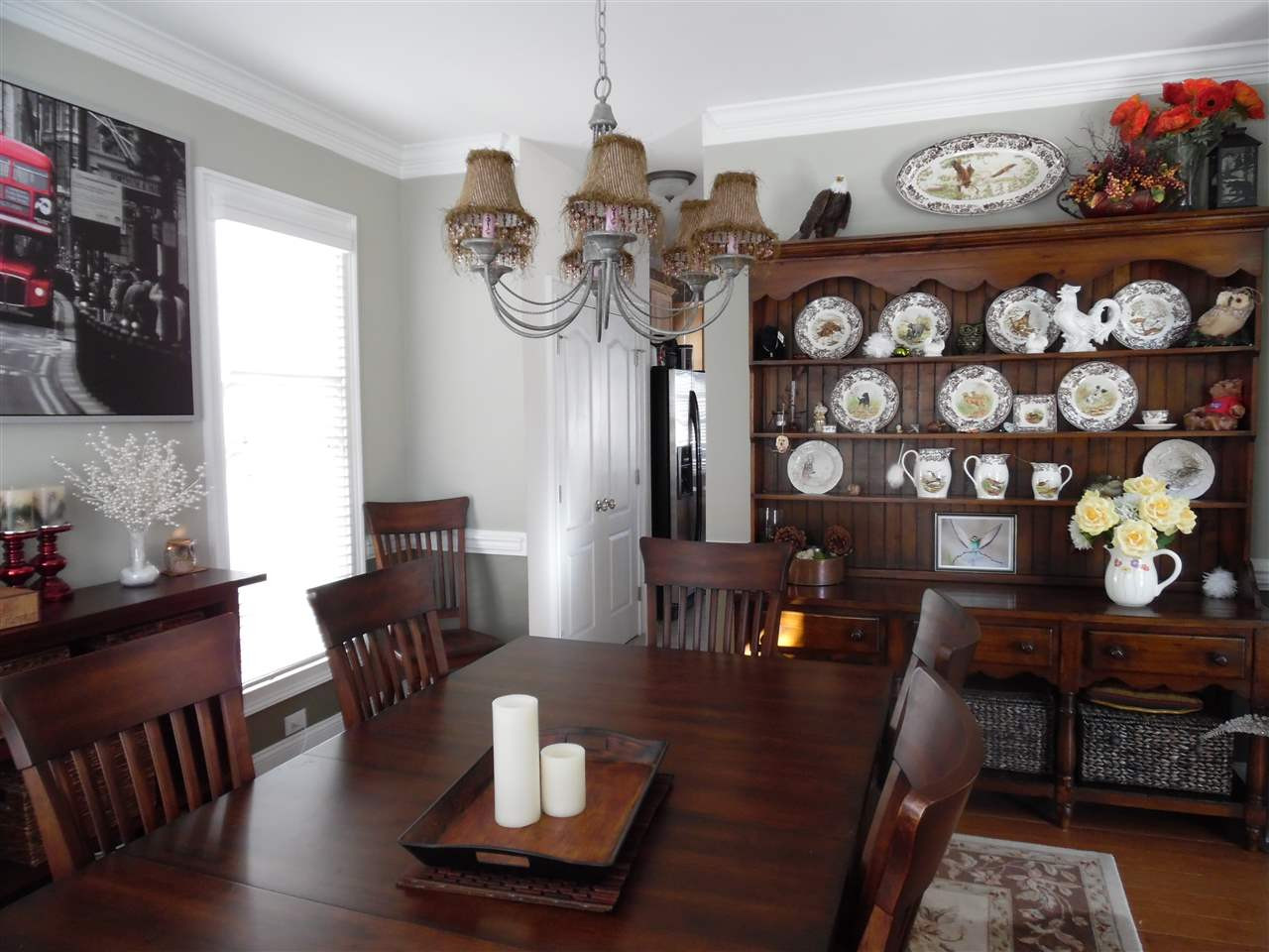 110 Fort Jackson Road Morrisville, NC 27560 - Photo 2 of 25 Formal dining room with beautiful trim and moldings & hardwood floors Dining Room