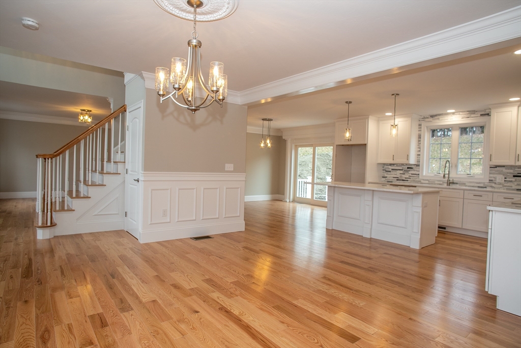 49 Spectacle Hill Road Bolton, MA 01740 - Photo 11 of 42 a view of a kitchen and kitchen with a sink wooden floor kitchen view