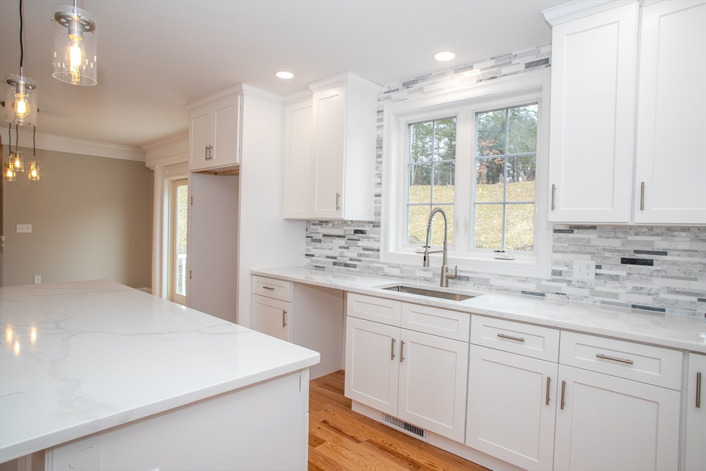 49 Spectacle Hill Road Bolton, MA 01740 - Photo 16 of 42 a kitchen with sink stove and refrigerator