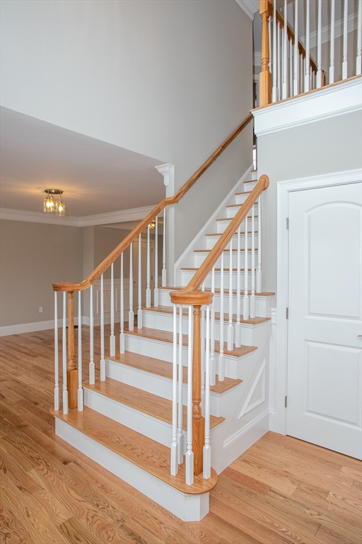49 Spectacle Hill Road Bolton, MA 01740 - Photo 26 of 42 a view of staircase with white walls and railing