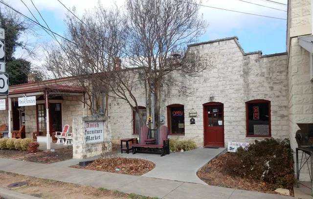 a view of a house with a tree