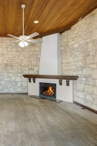 a view of a brick house with a large window