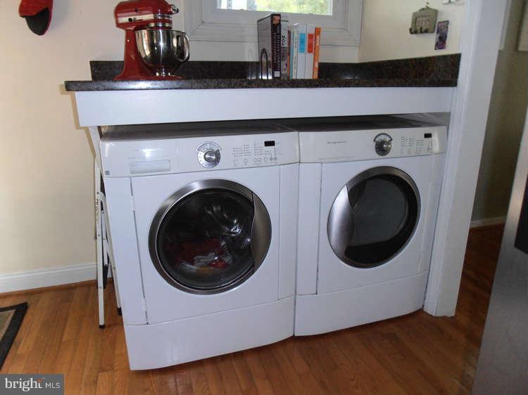 6814 Quander Road Alexandria, VA 22307 - Photo 14 of 16 a utility room with dryer and washer